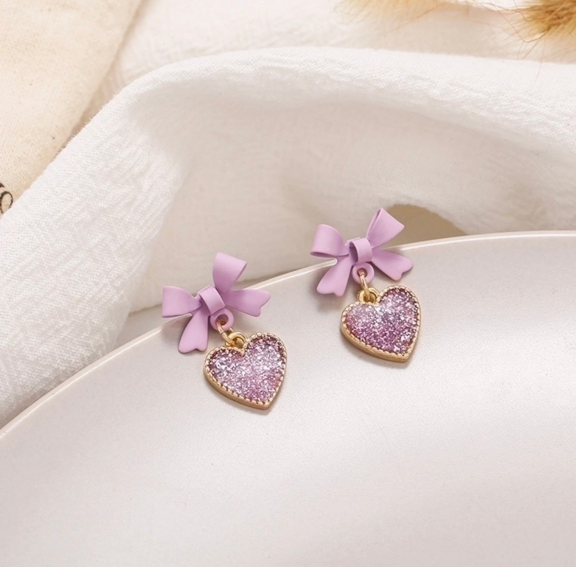 Aretes Moño Corazón Lila